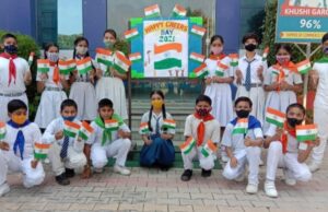 Students greeted the players by waving Tiranga